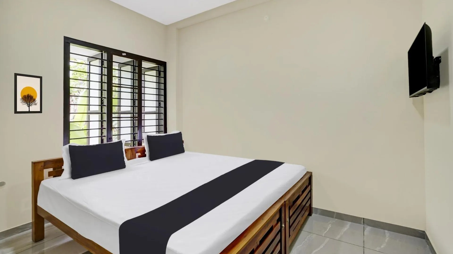 Hotel O Souparnika Residency Pathanamthitta