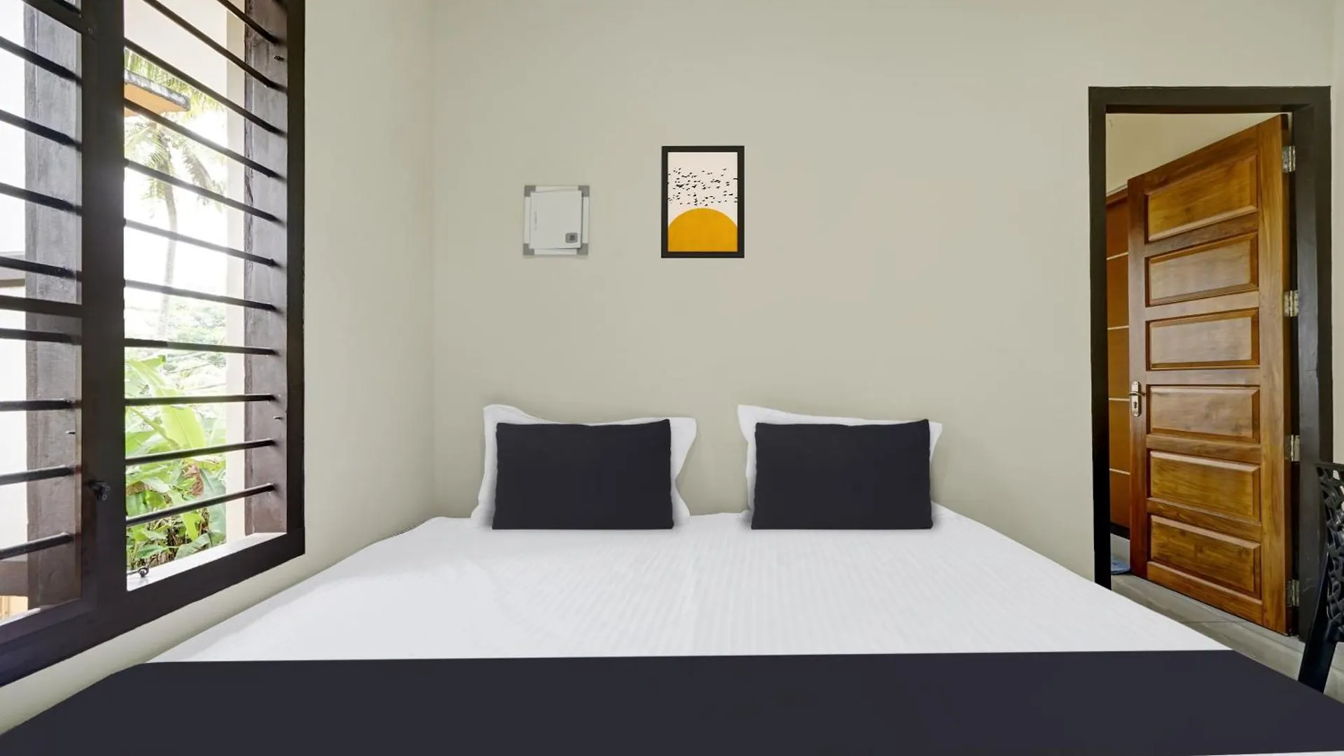 Hotel O Souparnika Residency Pathanamthitta